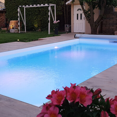 white swimming pool with LED lamps