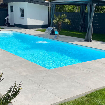 Skimmer pool with waterfall
