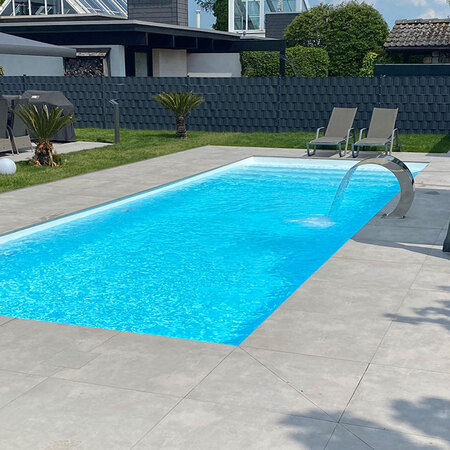 white swimming pool with skimmers